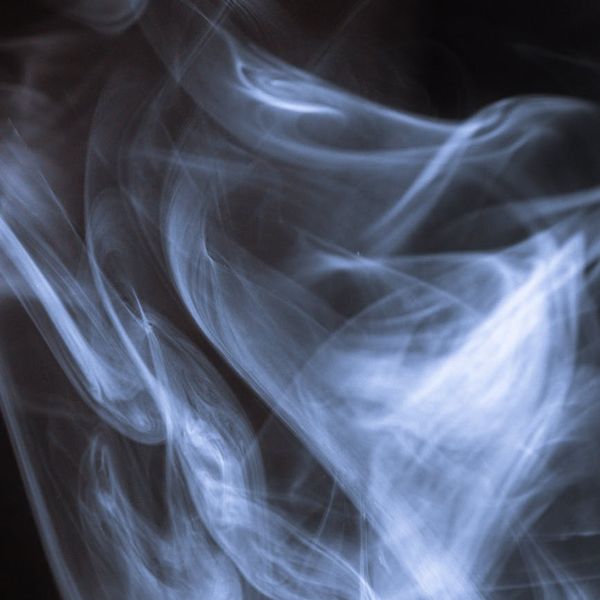 Abstract depiction of airflow or gentle waves, symbolizing breath.